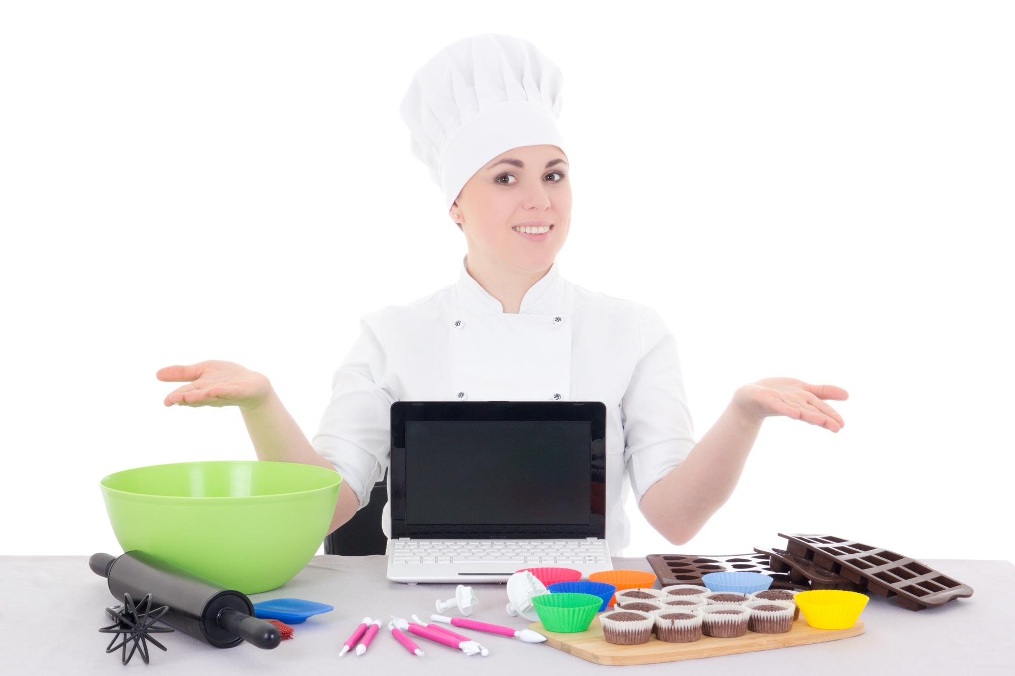 Chef teaching online from elegant kitchen